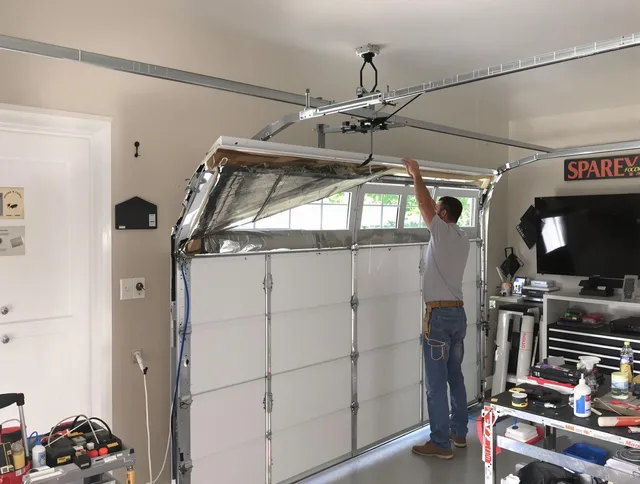 Garage door section replacement by Darien Garage Door Repair in Darien