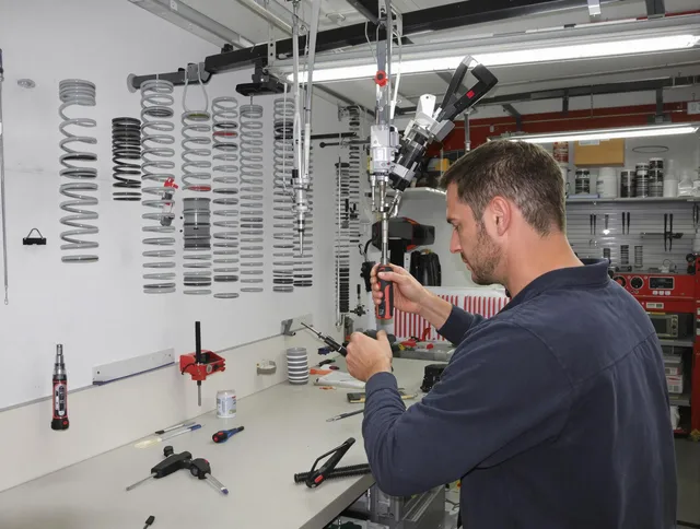 Darien Garage Door Repair safety certified technician performing precision spring replacement in Darien
